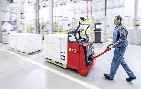 employee stores goods with new linde t20 30 ex low lift truck