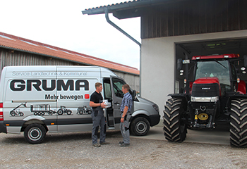 Mobile workshop service on site with farmer