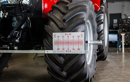 Gauge measurement on red Case IH tractor
