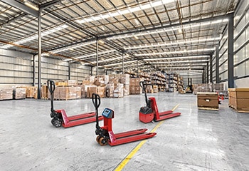 Three pallet truck red Linde warehouse with scale hand pallet truck