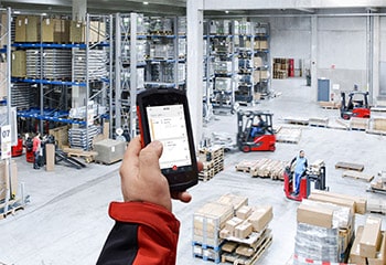 Truck Call App on Smartphone in Warehouse Logistics from Above