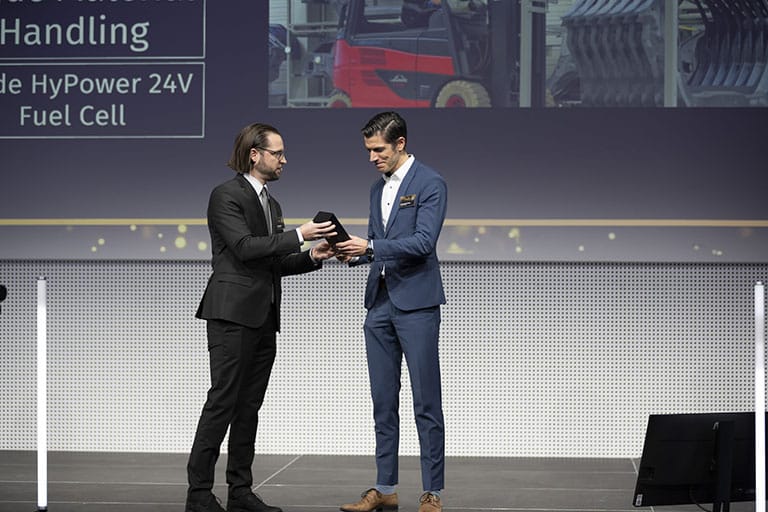 hofmann presents rochelmeyer best of industry award